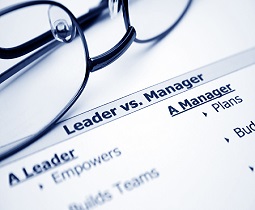 Image showing the phrase leader vs. manager